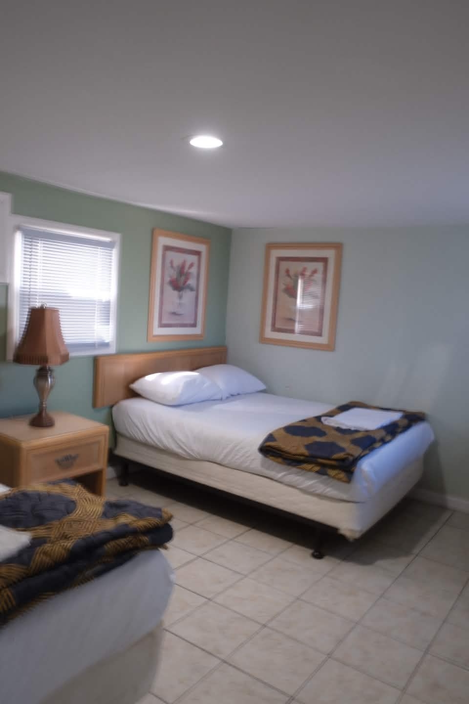 Double bedroom with sage green walls