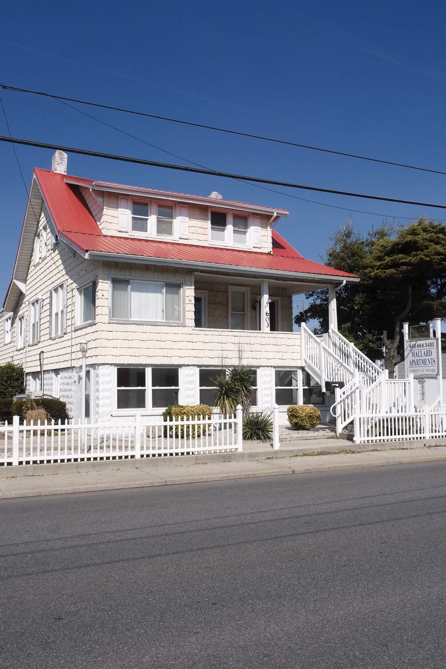 Mallard Apartments exterior with red roof