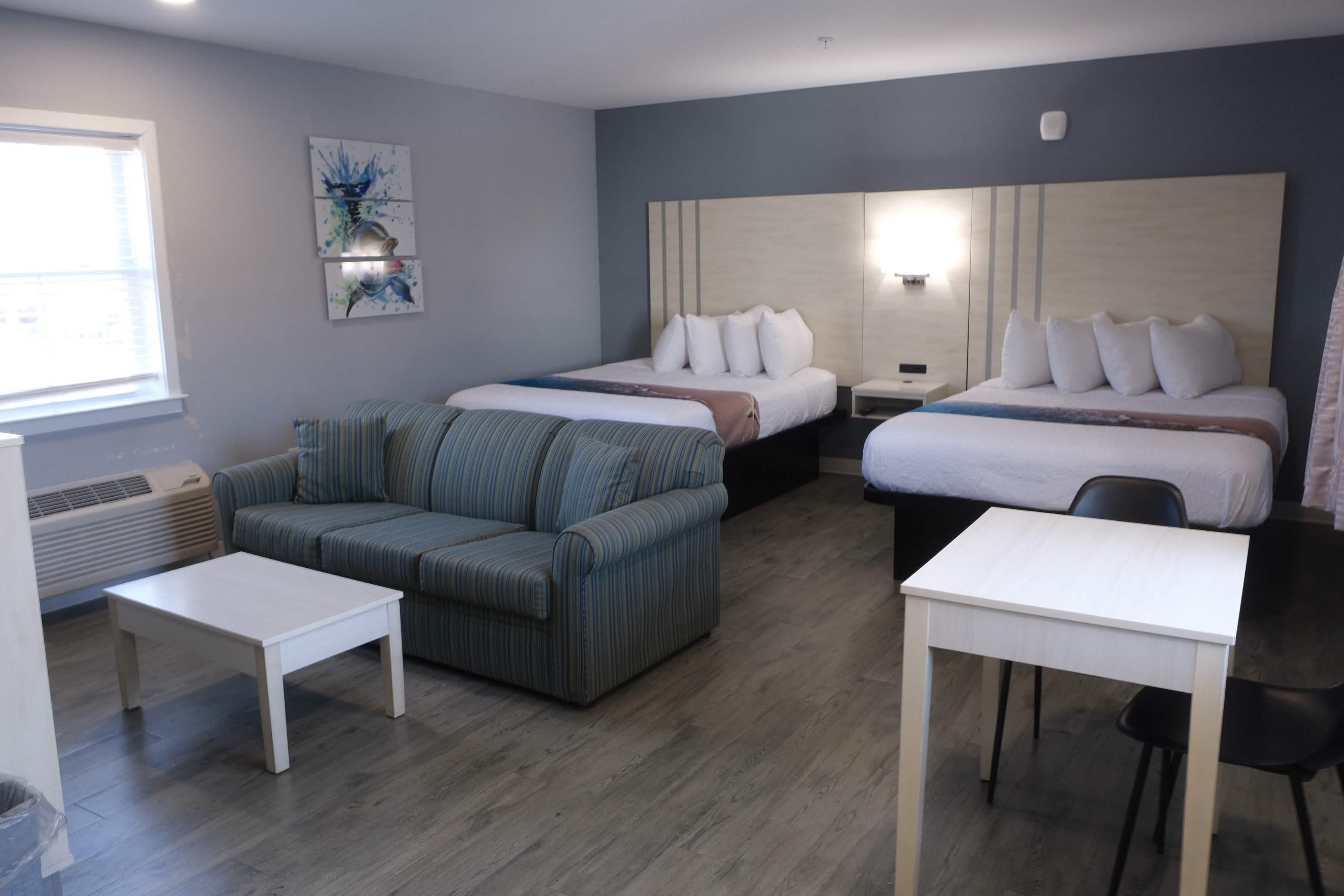 Suite with sofa and dining area